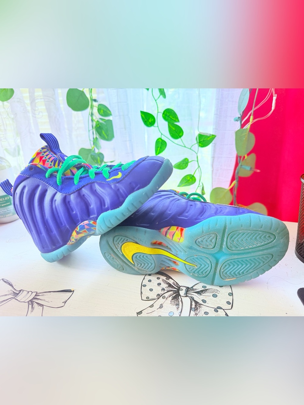 Nike Kids Purple Sneakers with Teal Soles and Bright Accent Details
